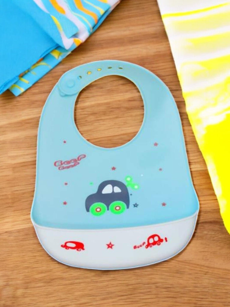 Creative display of Cool Cruiser Silicone Baby Bib with toy cars.