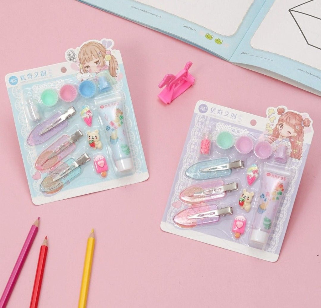 Yellow Bee DIY Resin Art Kits with glitter clips and tools, featured in blue and purple packaging.