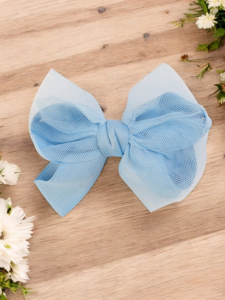 Creative view of Crystal Breeze Tulle Hair Bow for Girls in Blue showcasing its soft tulle layers