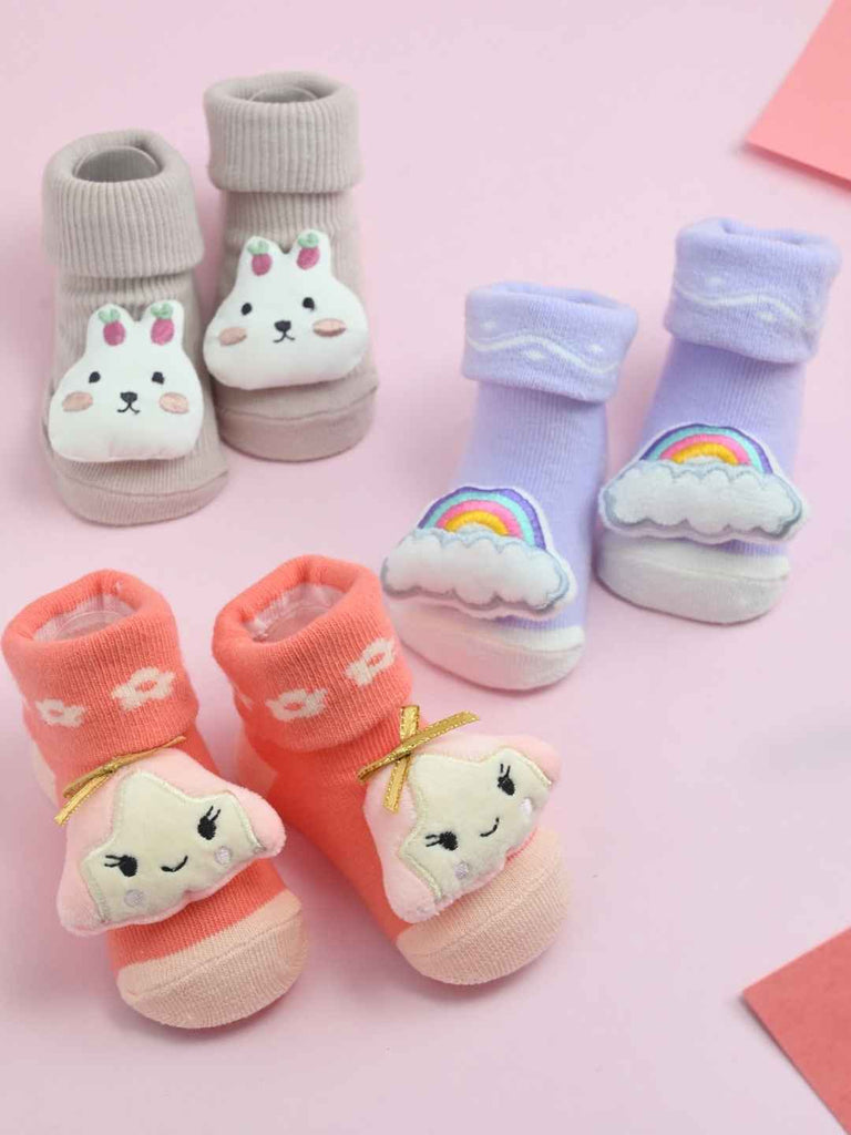 Cuddle Cuties Baby Socks Combo – 3D Pastel Booties with Bunny, Girl & Rainbow Appliqués- Creative view