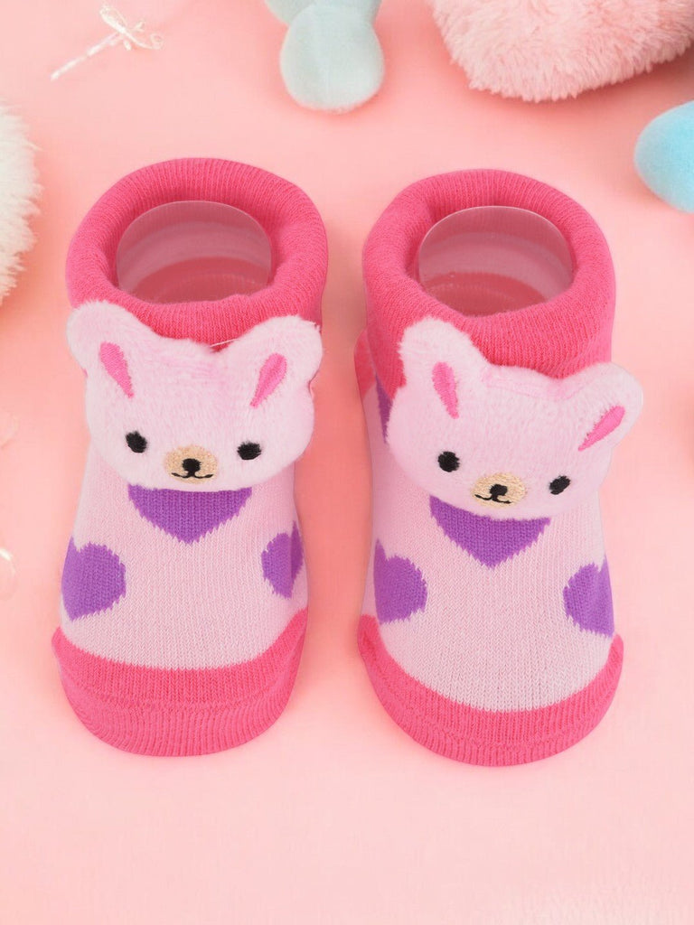 Pink Bear Stuffed Toy Socks on white background creative view