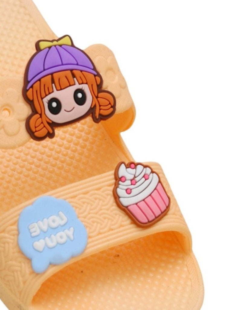 Close-up view of Cupcake & Delight Peach Sliders For Girls by Yellow Bee