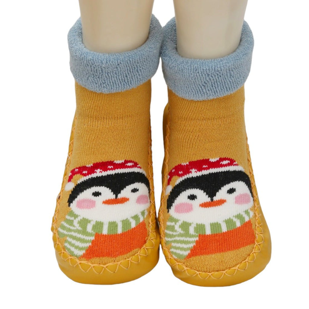 Penguin face stuffed toy sock for kids with non-slip bottom.