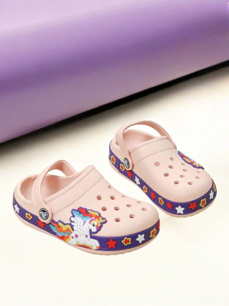 Peach-colored kids' clogs adorned with a unicorn and star pattern, perfect for imaginative play