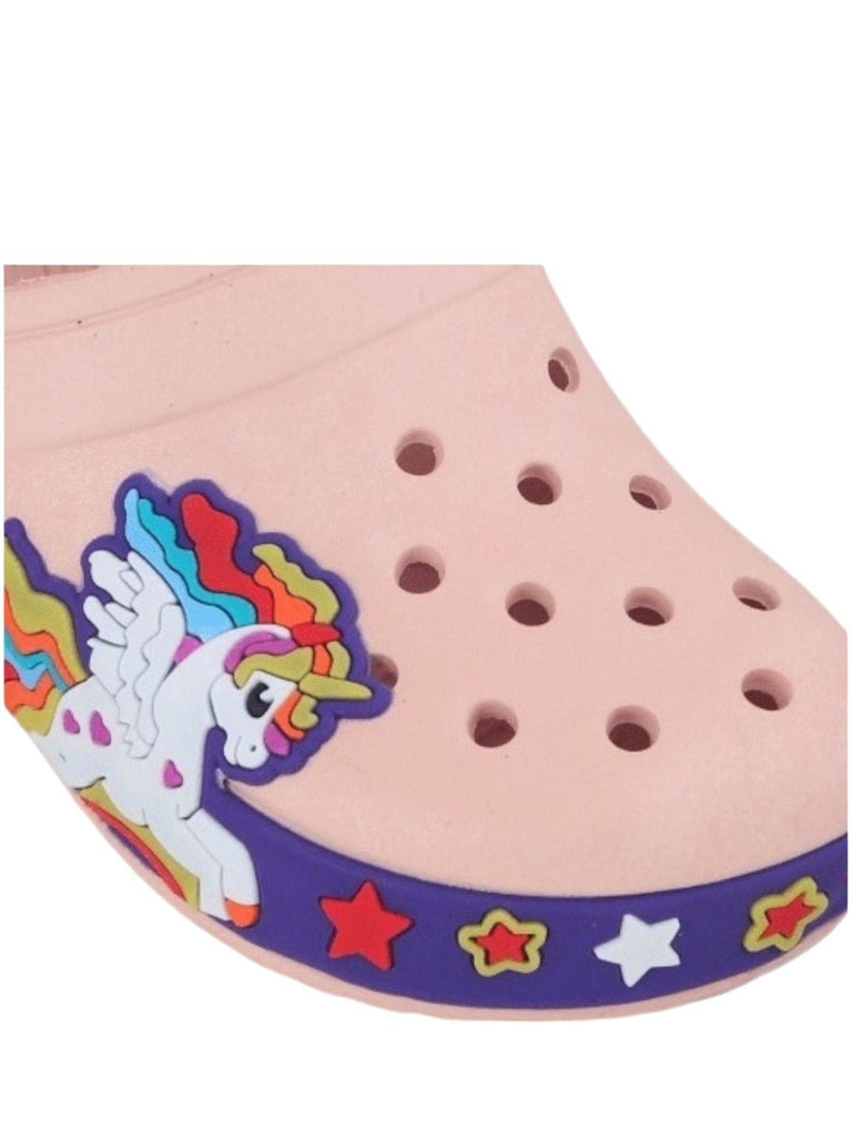 Close-up of a child's peach clog with a unicorn design, showcasing the playful aesthetic and breathable holes