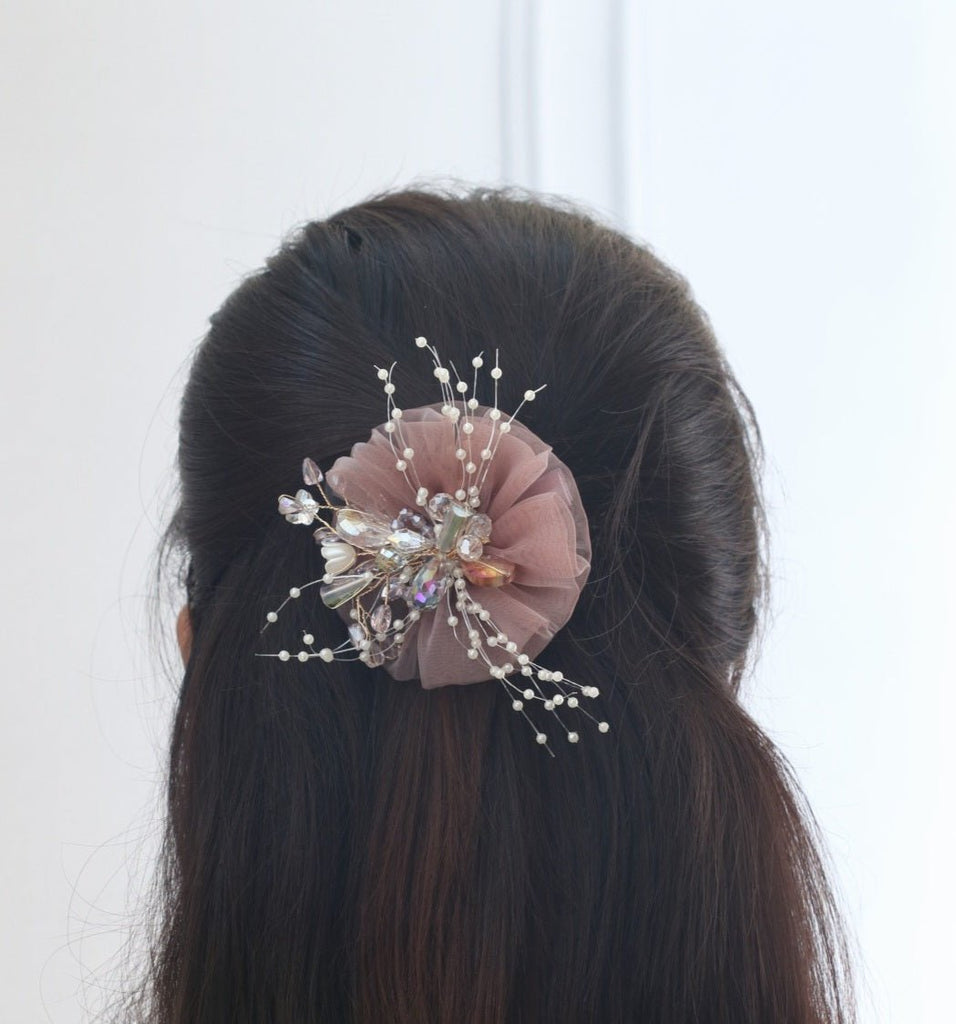 Side View of Yellow Bee's Light Mauve Flower Hair Clip with Elegant Rhinestone Detailing