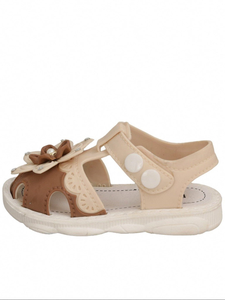 Side view of Elegant Beige Floral Sandals showcasing the floral details and pearl accents.