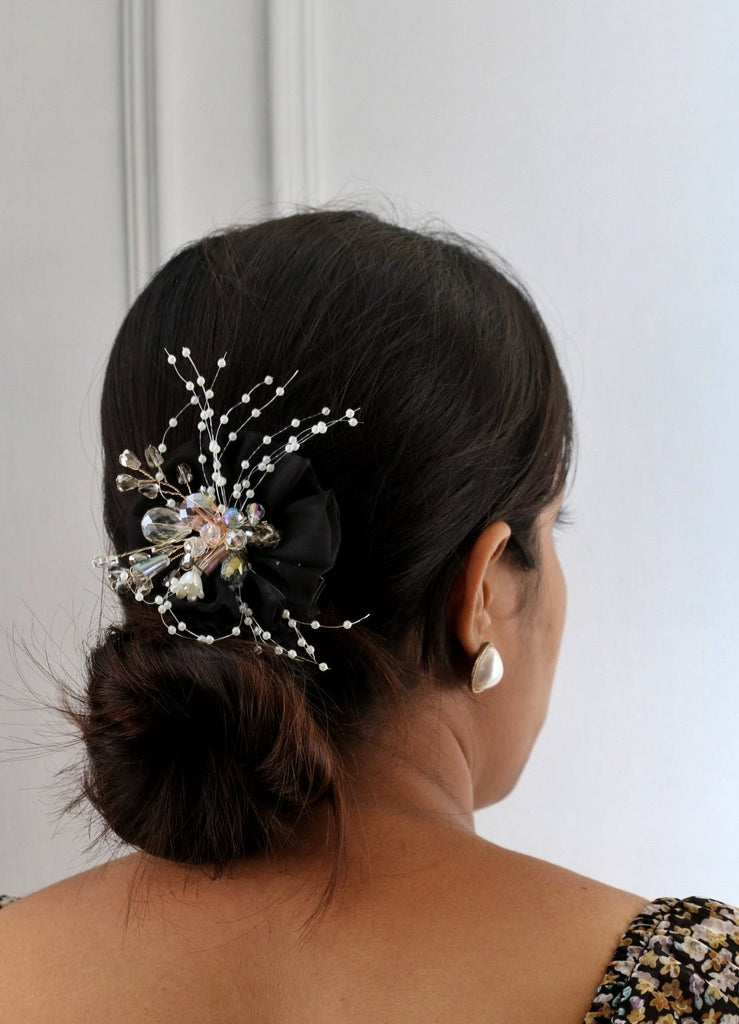 Yellow Bee's black hair clip featuring a net flower and delicate embellishments, perfect for enhancing bridal hairstyles.