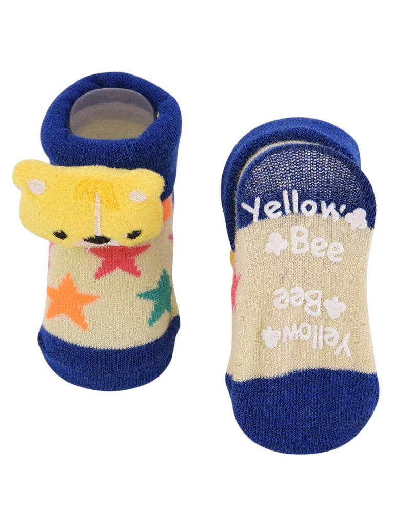 Front and back view of tiger-themed socks with star prints and non-slip soles, ideal for toddlers.