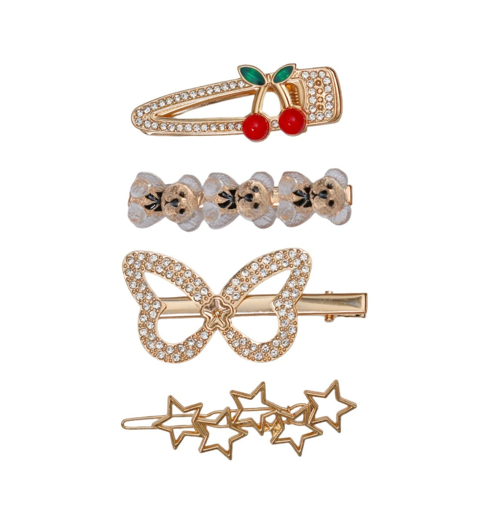 Yellow Bee's stone-studded hair clip collection featuring butterfly, cherry, and star designs in golden, red, and transparent colors.