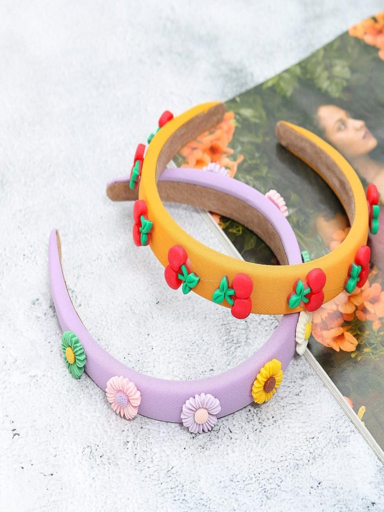 Creative display of Yellow Bee Fashionable Hairband Set in Purple and Orange