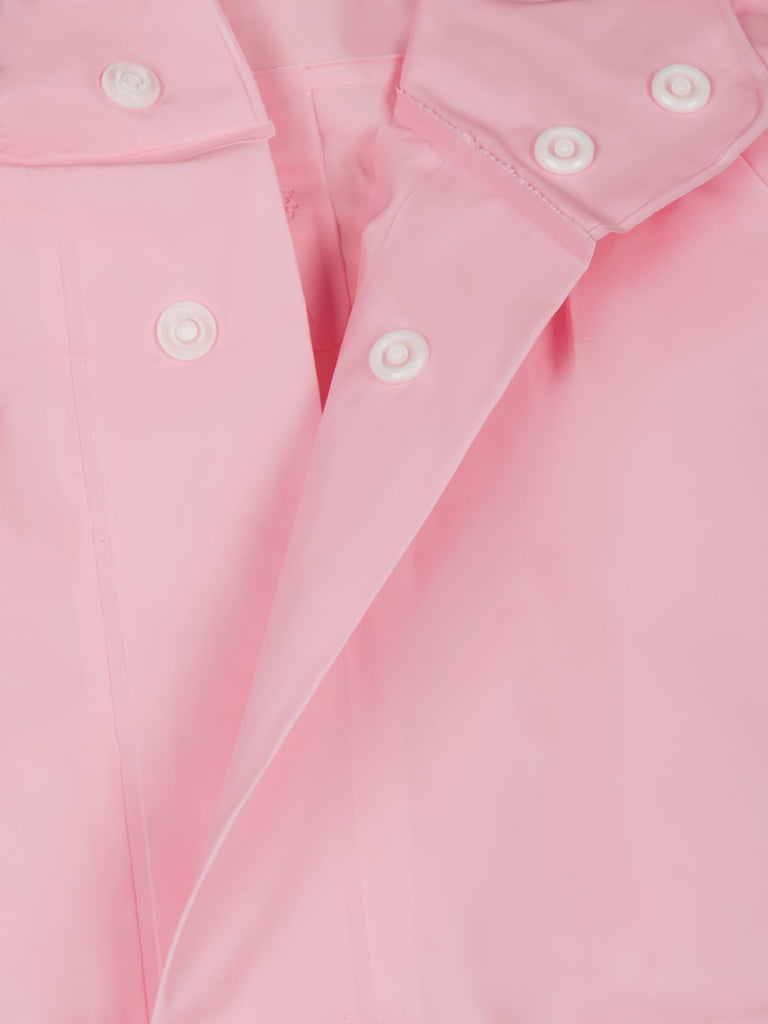 Close-up view showcasing the button closure and cuff details of the girls' pink space-themed raincoat.