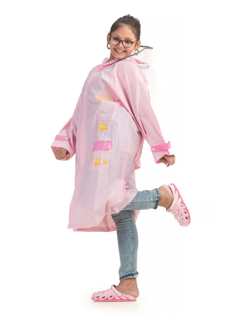 Angle view of Yellow Bee girls' pink raincoat with astronaut and star graphics.