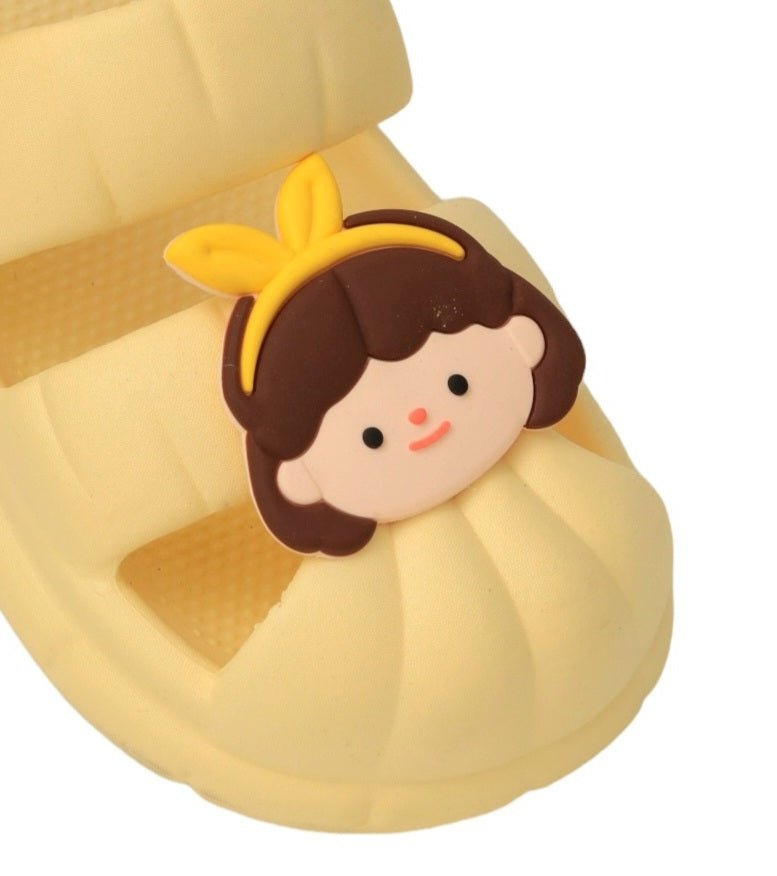 Yellow bee  sandals with cute doll face design close up  view.