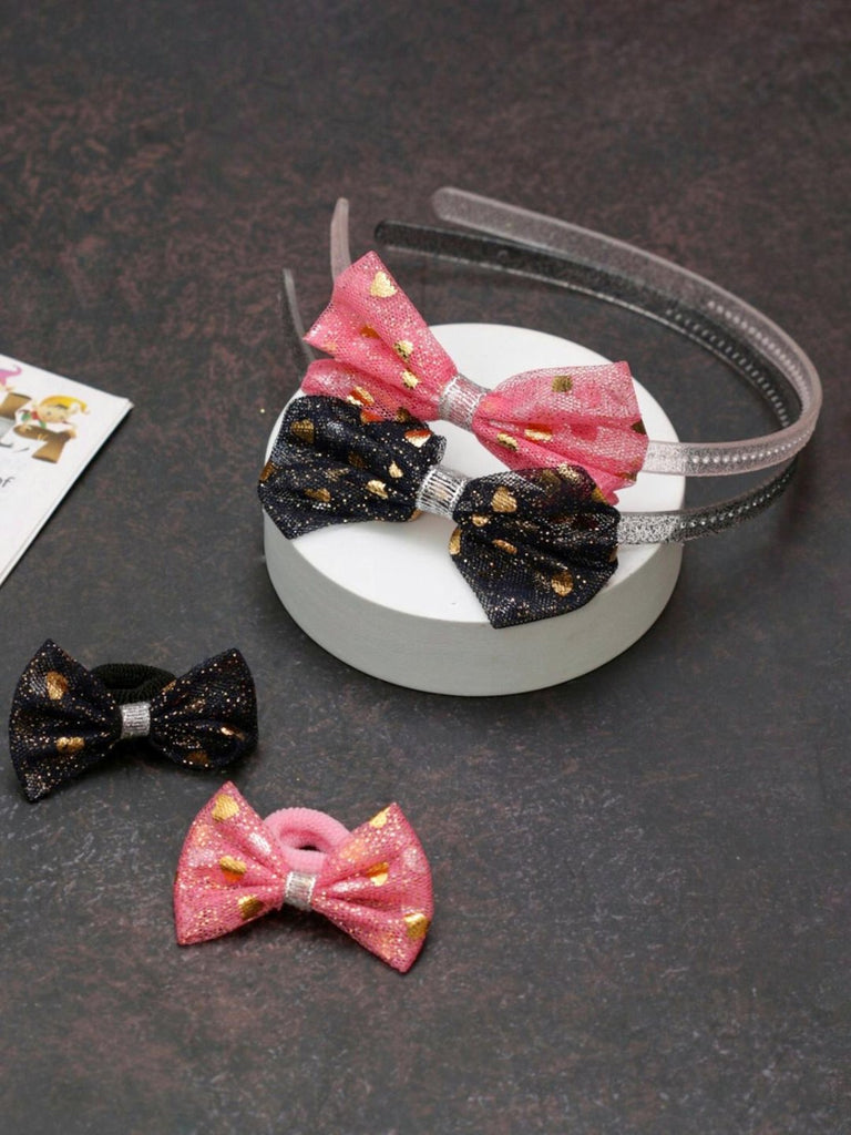 Creative display of Yellow Bee's pink and black bow hair accessories set