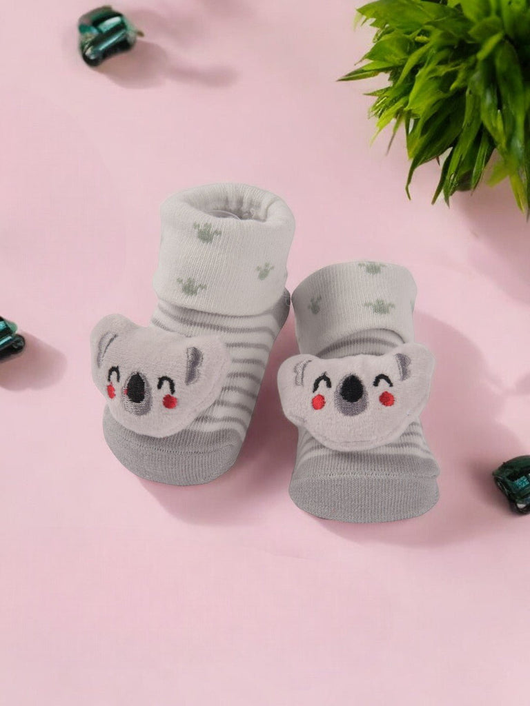 Creative view of Grey Baby Booties with 3D Koala Face featuring soft fabric and adorable koala design.