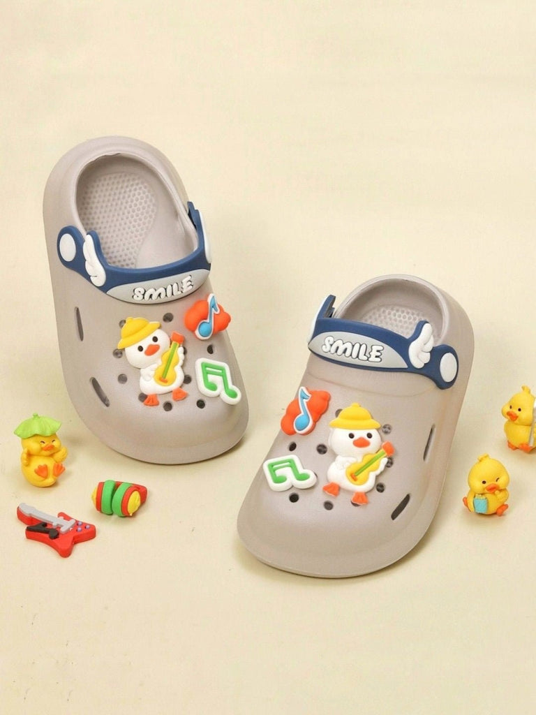 Creative display of Yellow Bee's grey clogs for kids with playful snowman and music design