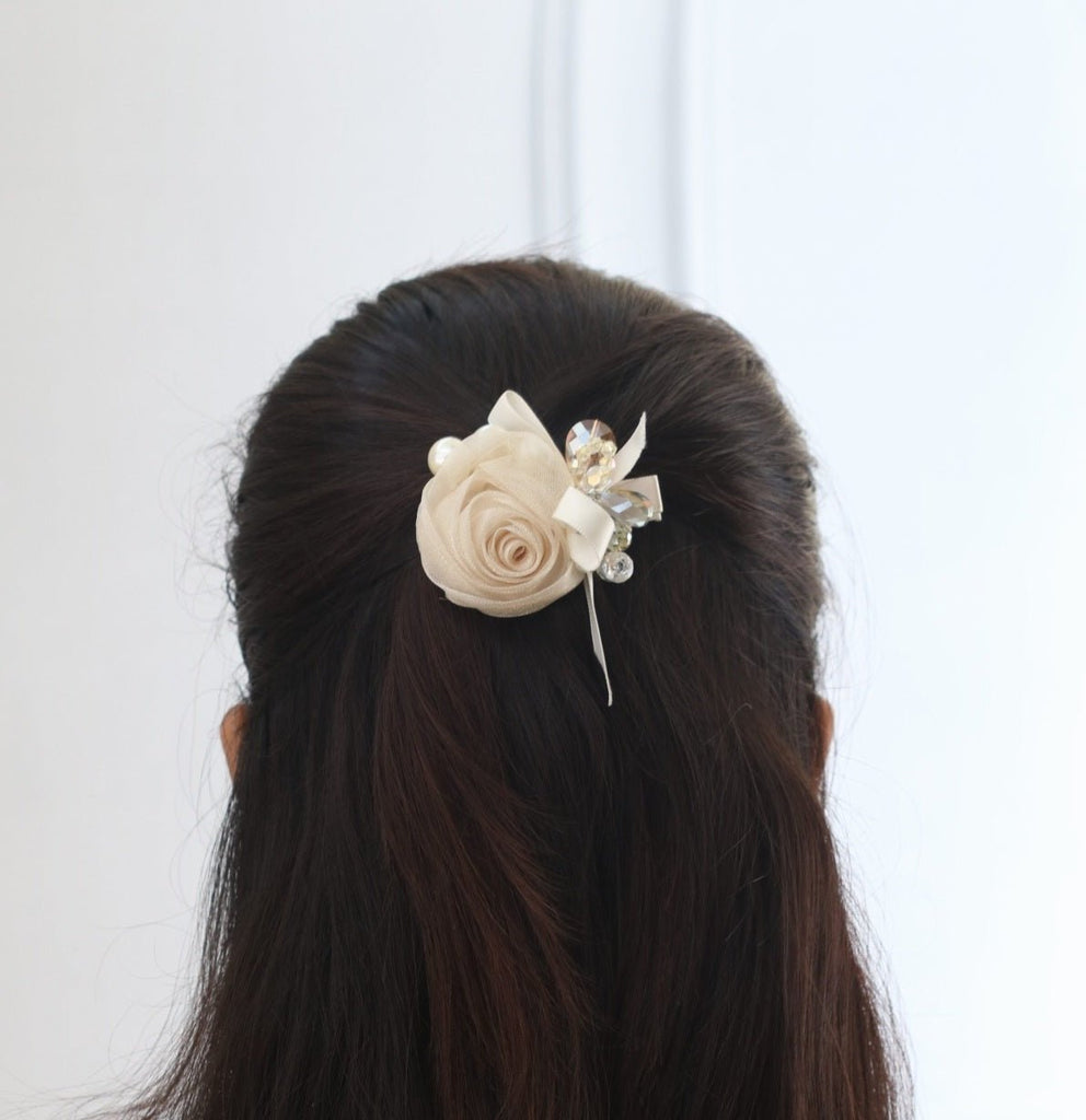 Elegant off white Yellow Bee hair clip with rosette design and faux pearl embellishments.