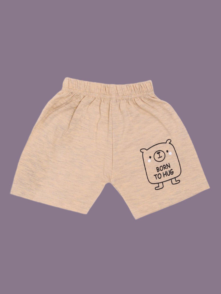 Bottom View of the beige shorts from the Boy’s Beige ‘Born to Hug’ Bear Graphic T-Shirt and Shorts Set, featuring a small matching bear graphic on the leg.