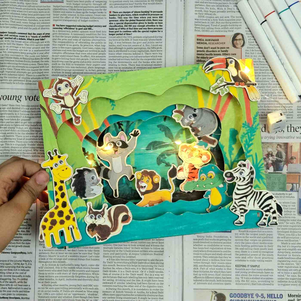 Detailed design view of the Jungle Safari 3D Adventure DIY Light Box Kit during assembly.