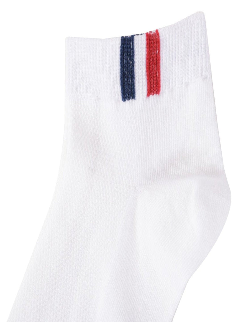 Close-up of the stripe pattern on white ankle socks