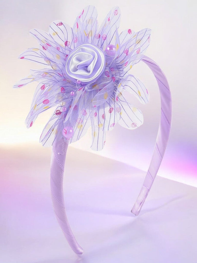 Purple cotton ruffle flower hair band front view.