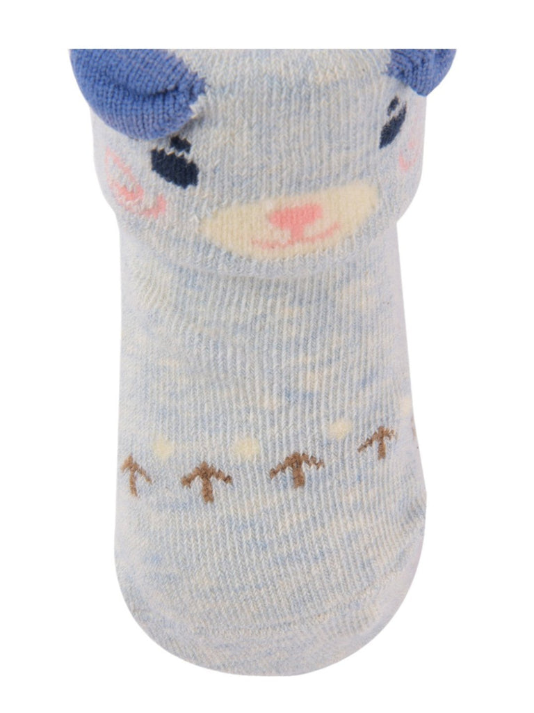 Close-up view of Light Blue Baby Socks with Cute Bear Face and Ear Accents.