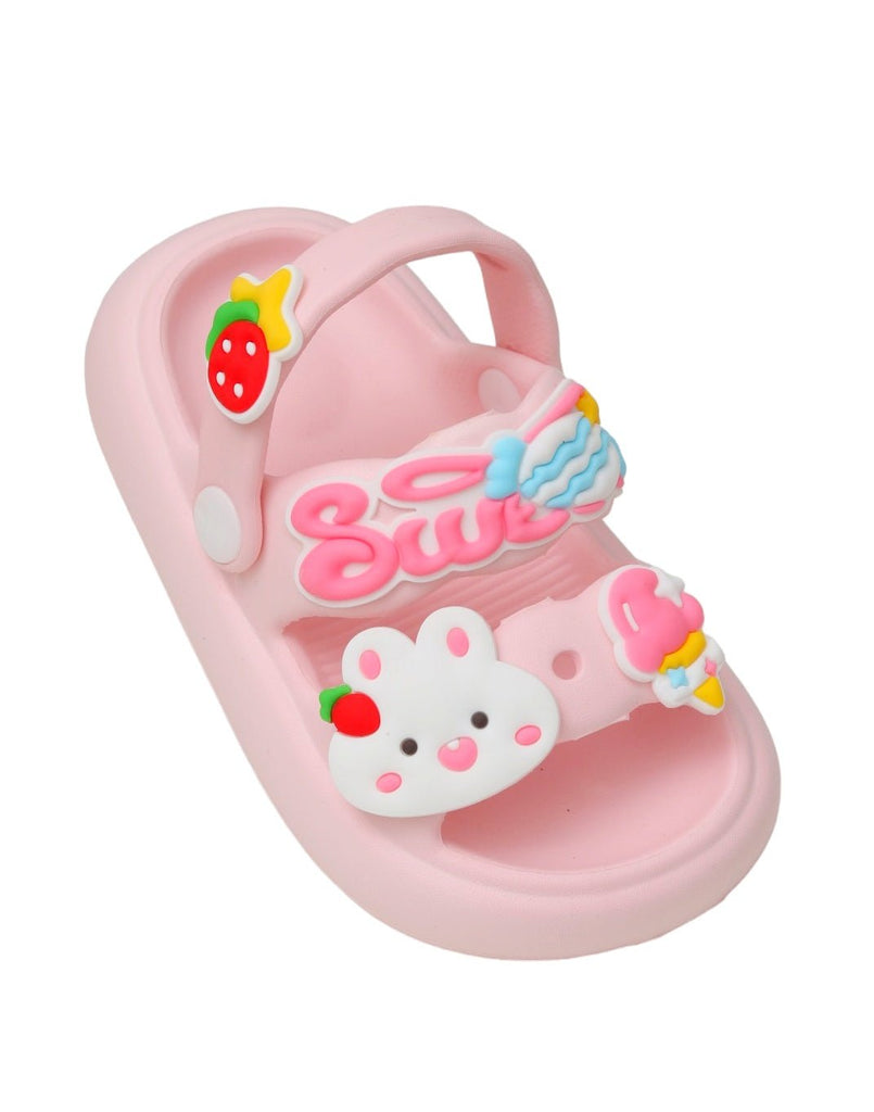 Pink sandals for girls with bunny and strawberry charms from an angle view