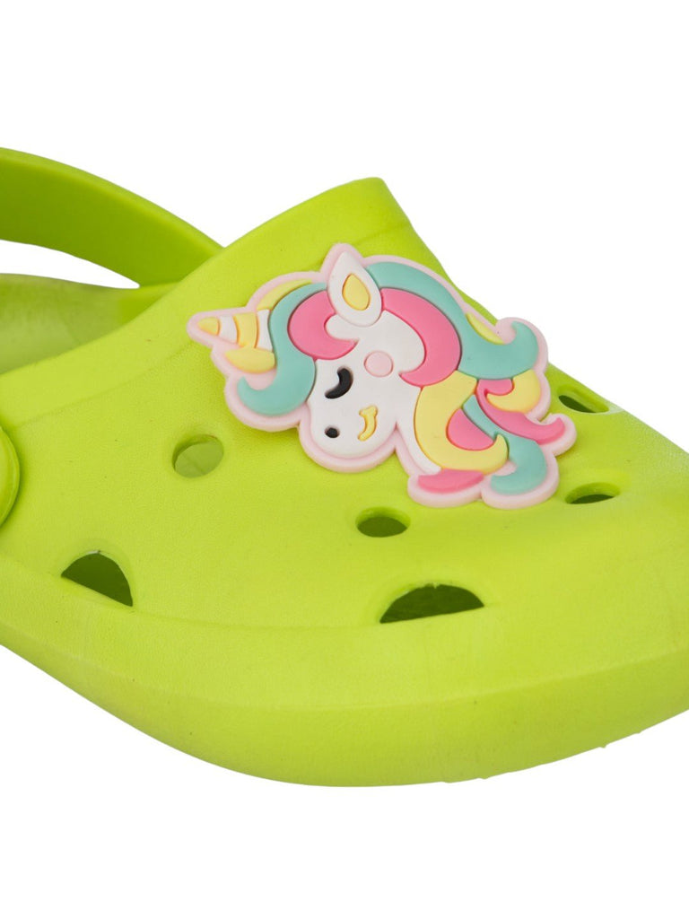 Close-up of unicorn design and ventilation holes on front toe of green clog