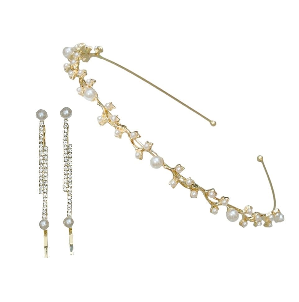 Elegant metallic leaf hair accessories set by Yellow Bee featuring rhinestones and pearls in golden, white, and silver.