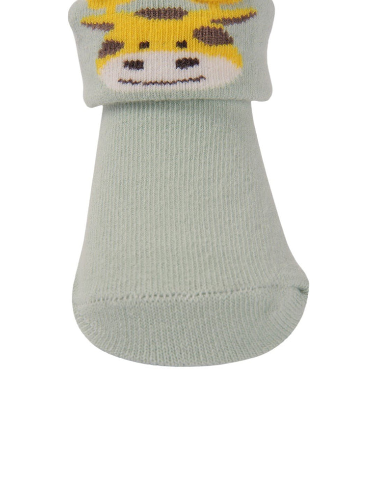 Close-up view of Mint Green Baby Booties with 3D Giraffe Face by Yellow Bee, showcasing the soft fabric and fun giraffe design.