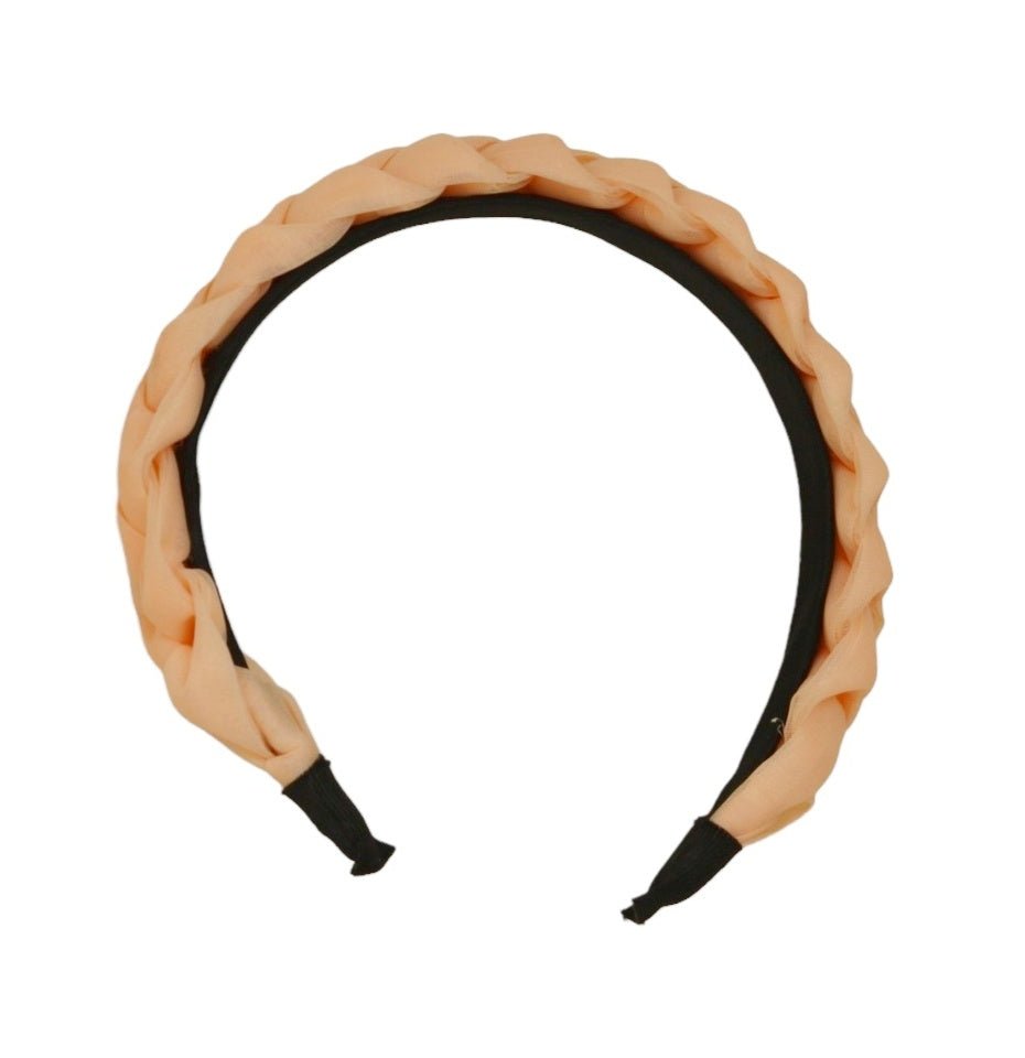 Side view of the elegant Peach Braided Hairband by Yellow Bee.