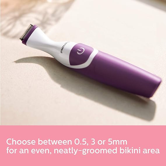 Close-up of Philips Bikini Trimmer in purple showing different trimming lengths.