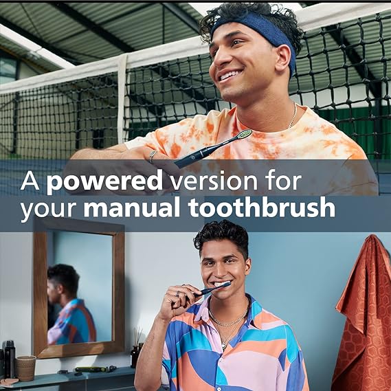 The Philips One by Sonicare electric toothbrush in navy blue, with a focus on the brush head designed for thorough and gentle cleaning.
