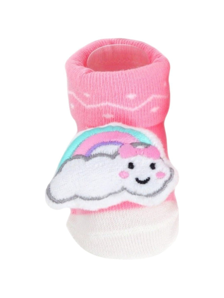 Close-up view of pink baby booties with a cute 3D rainbow and cloud design, perfect for infants.