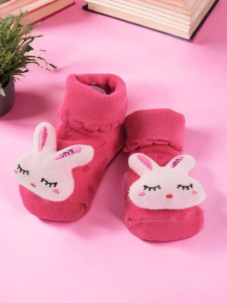 Pink_Baby_Socks_with_Adorable_Bunny_Face_Design_Creative_View-Photoroom