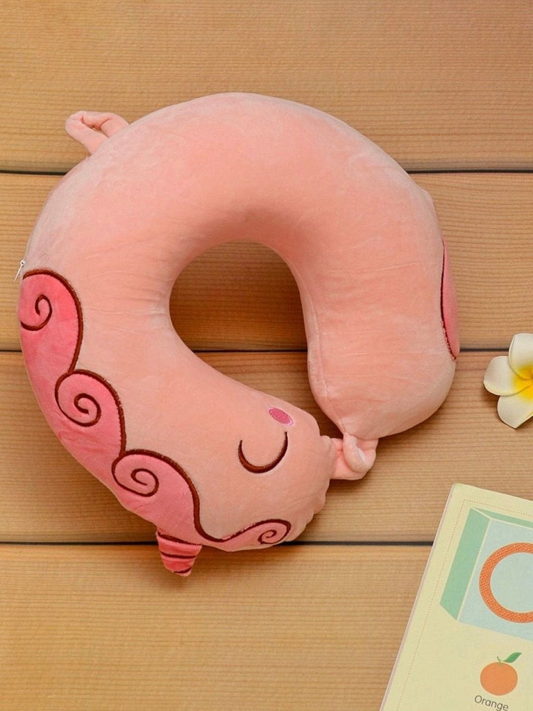 Creative view of the Pink Unicorn U-Shaped Travel Neck Pillow for Girls displayed in a decorative setting