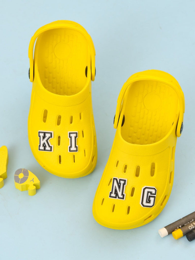 Playful_Stylish_Clogs_with_KING_Letter_Charms_for_Boys-_Yellow-Creative_View