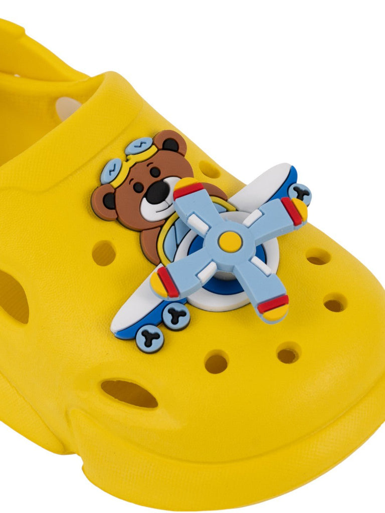 Playful Yellow Clogs with Rotating Pilot Bear & Airplane Charms for Boys-Close up view