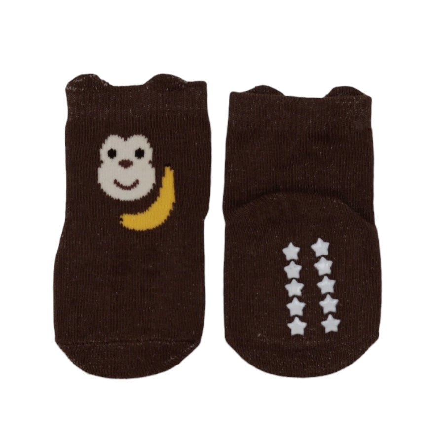 Close-up of brown  baby socks with dedicated white Monkey and Star designs.