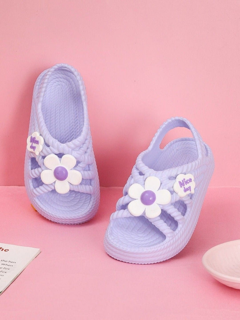 Stylish Yellow Bee Kids' Purple Clogs with Flower Design on Display