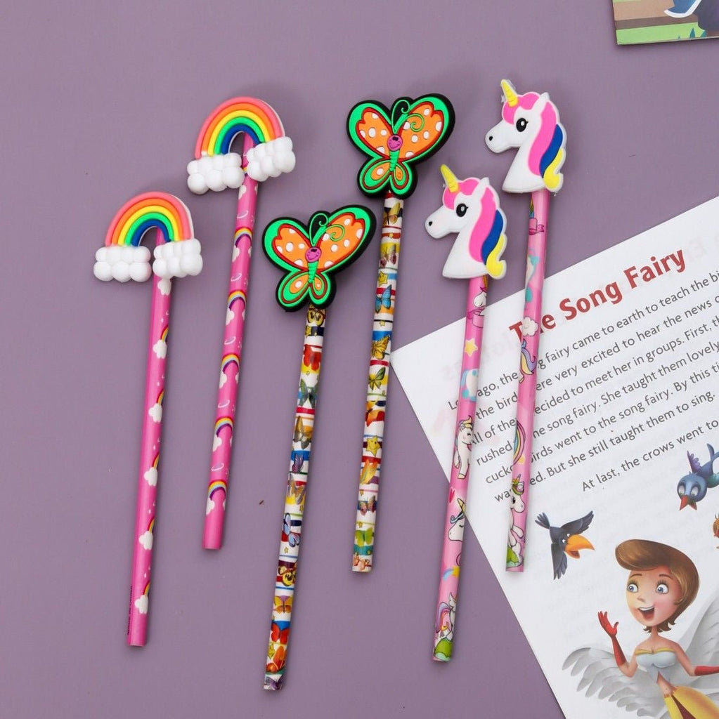 Yellow Bee's "Whimsy Write" pack of pencils with playful rainbow, butterfly, and unicorn toppers for imaginative writing and drawing.