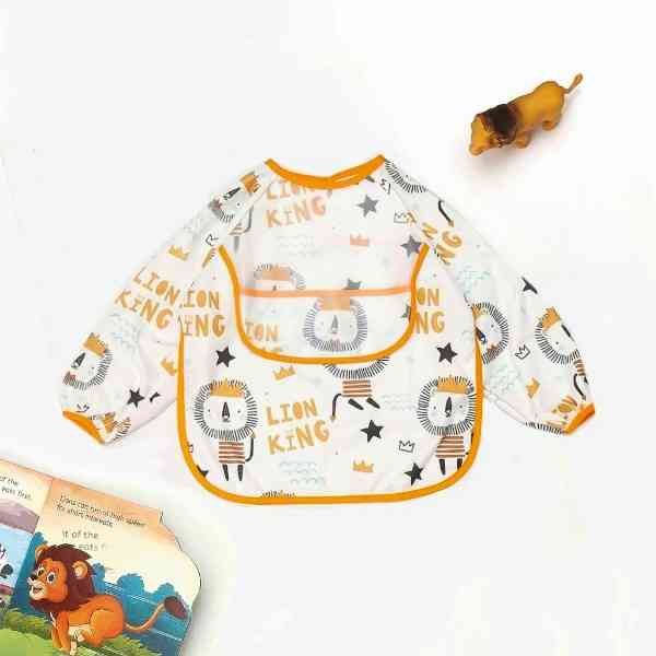 Creative display of Regal Lion King Long-Sleeve Baby Bib set in a playful environment