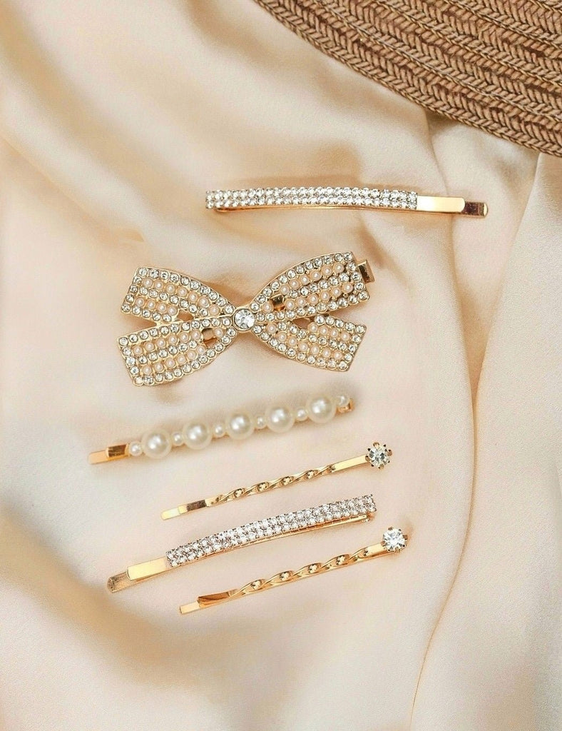 Dazzling set of Yellow Bee rhinestone bow and faux pearl hair clips in golden and white, perfect for adult wedding hairstyles.