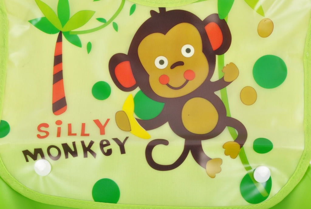 Close up of the Yellow Bee Monkey Easy Clean Bib with Crumb Collector, featuring a cute monkey design.