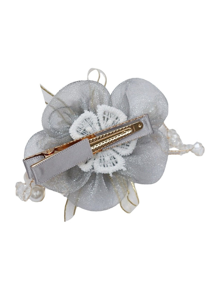 Yellow Bee's grey embellished hair clip with a sturdy alligator clasp for secure placement.