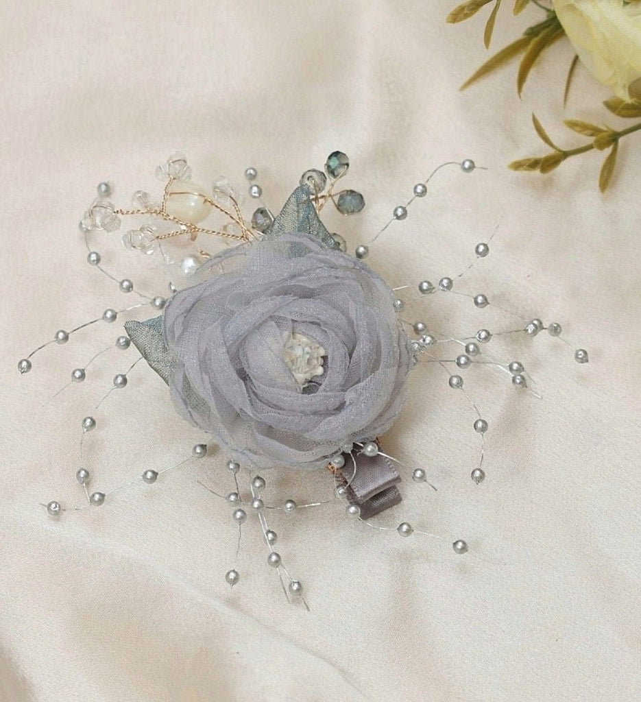 Grey Rosette Hair Clip by Yellow Bee Styled on Fabric - Luxurious Wedding Hair Accessory