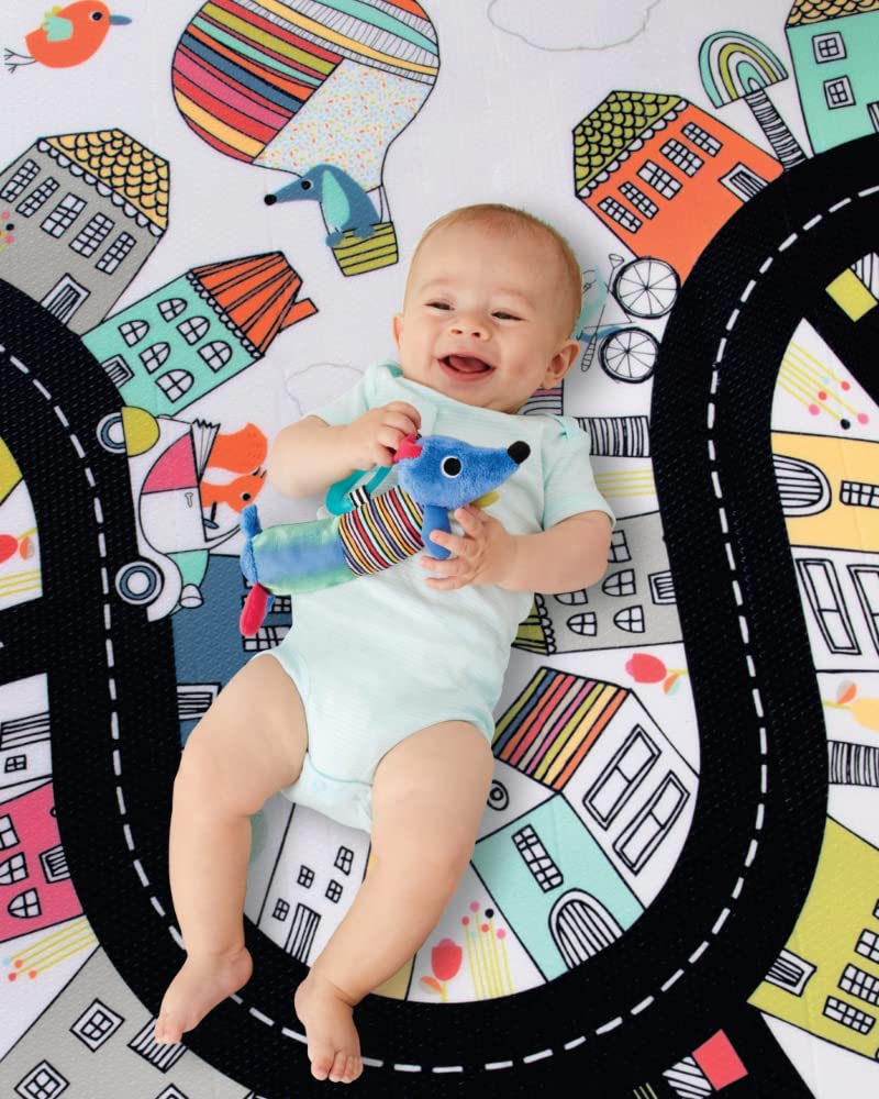 Close-up of the playful, kid-friendly side of the Skip Hop Doubleplay Reversible Playmat in Vibrant Village theme.