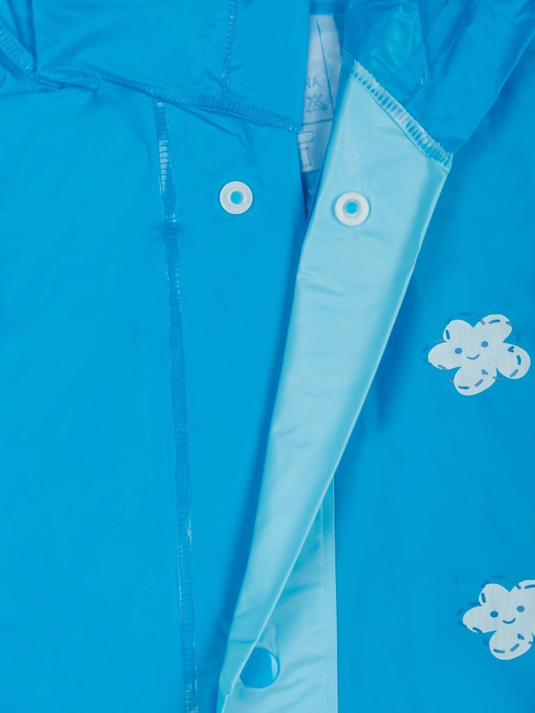 Detailed view of the button closure of the Sky Blue Adventure-Themed Raincoat for Boys.