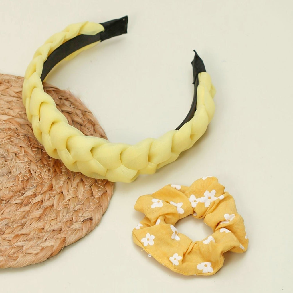 The Yellow Bee yellow hairband and scrunchie combo styled with a straw hat for a lifestyle look.